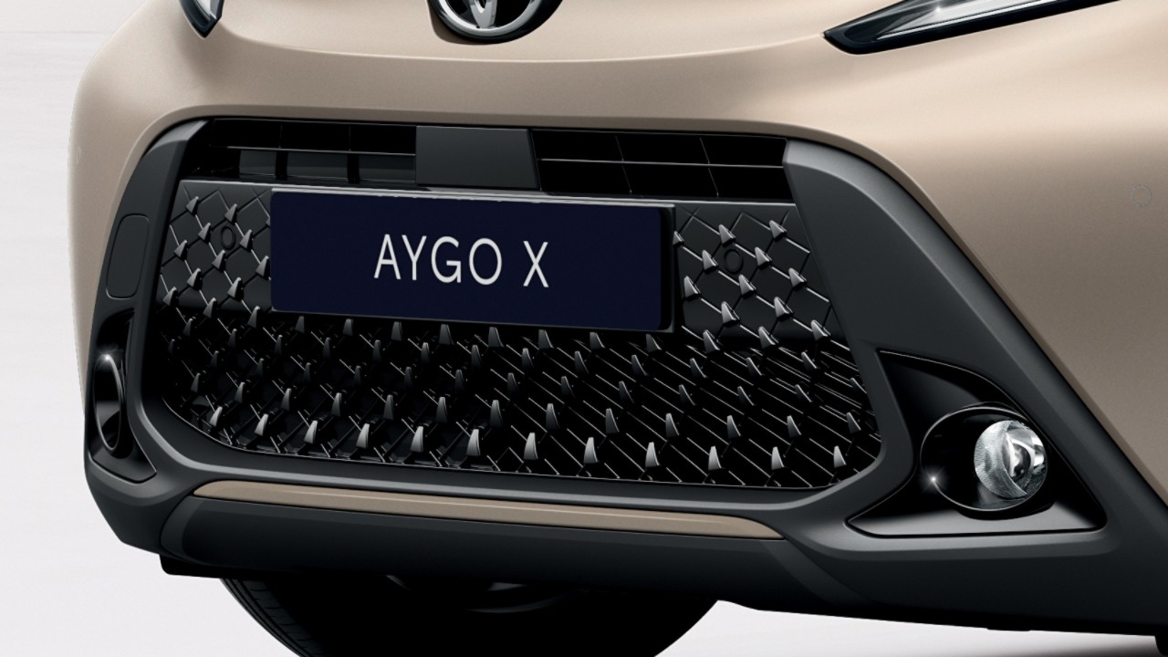 toyota-aygo-x-2022-hotspot-detail-grille-beige